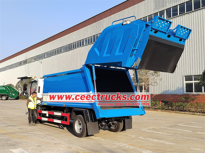 Isuzu refuse compactor truck