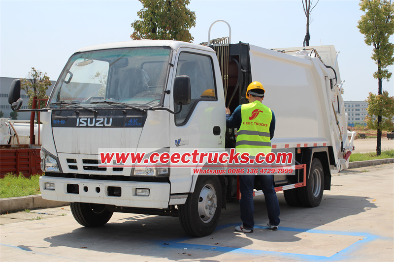 ISUZU refuse compactor truck testing by CEEC TRUCKS engineer ISUZU 10cbm refuse compactor truck