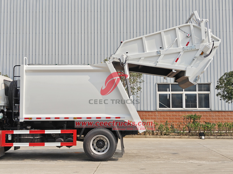 Isuzu refuse compactor truck hopper device