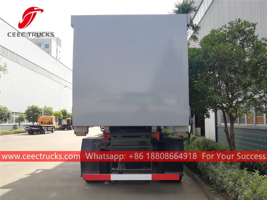 Máy xúc lật Dongfeng Hook có thùng chứa máy đầm